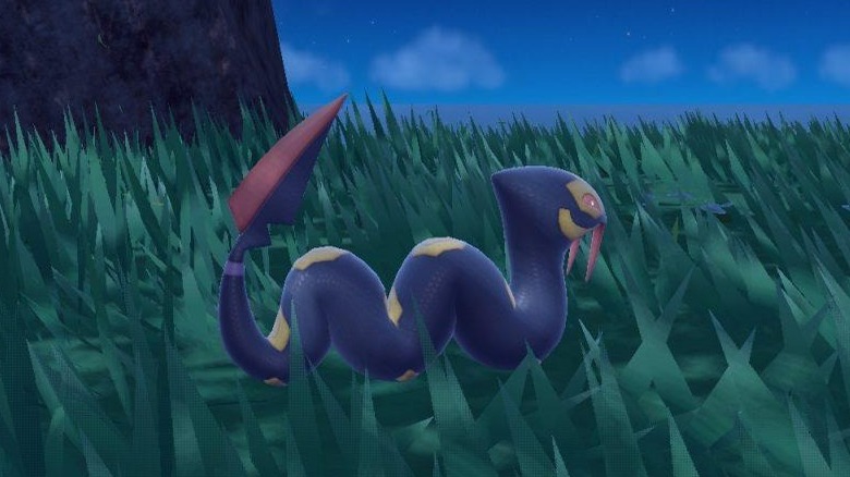 Seviper in a grass field