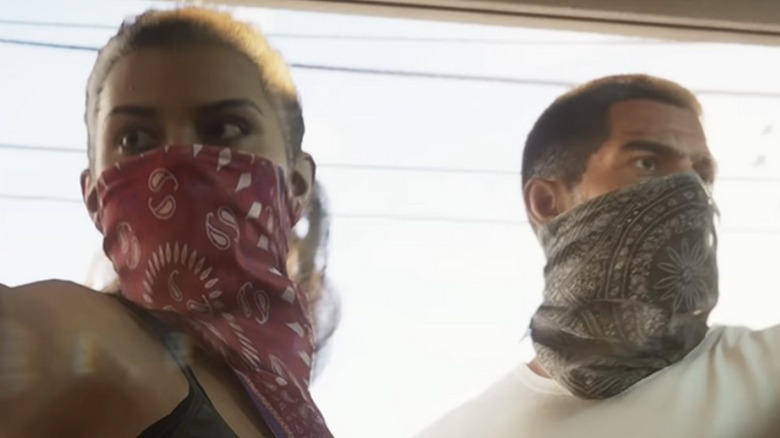 Lucia and Jason wearing masks over their faces