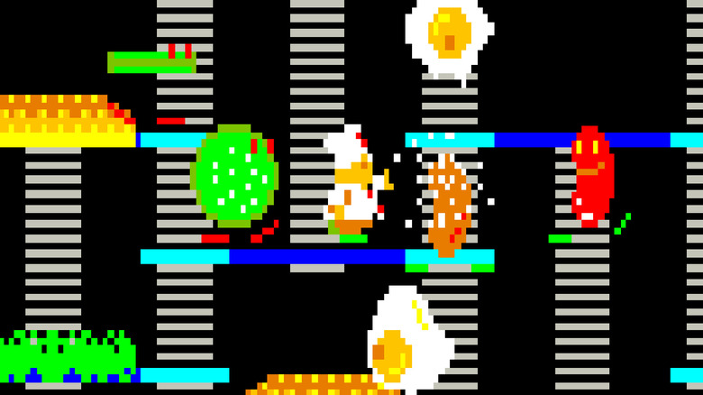 Peter Pepper flings pepper at a sausage in BurgerTime