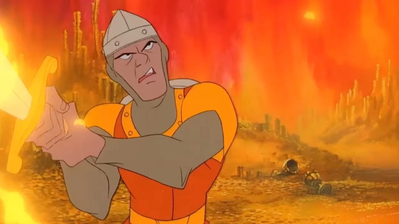 Dirk the Daring holds a glowing sword while looking up in a room filled with gold in Dragon's Lair