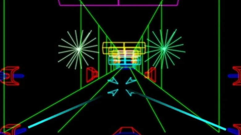 A cockpit looks down an obstacle-filled and colorful trench in Star Wars (1983)