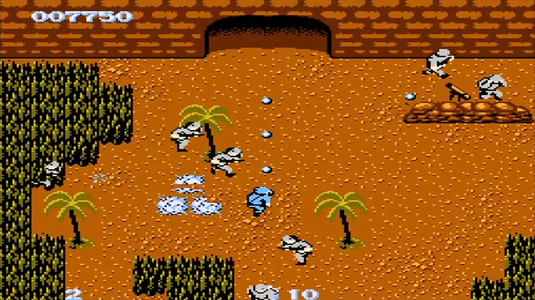 Super Joe finds a crowd of gray-clad soldiers by a brick wall in "Commando"