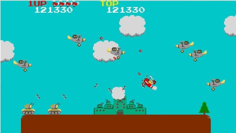 A red biplane battles a squadron of gray biplanes in "Sky Kid"
