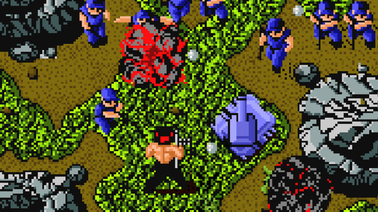 The player character blows up an enemy squad in Ikari Warriors
