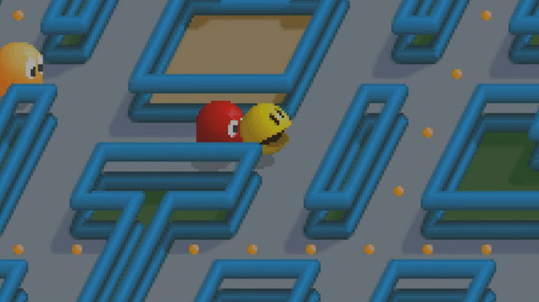 Pac-Man is pursued by a red ghost in Pac-Mania