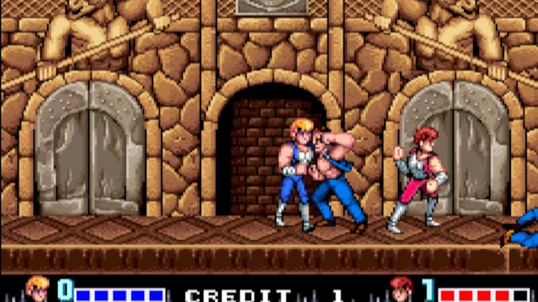 Billy and Jimmy Lee fight crooks in "Double Dragon" (1987)