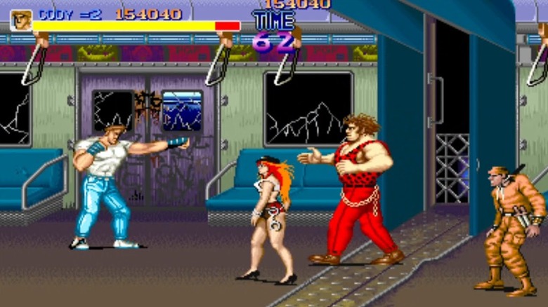 Cody Travers faces a group of advancing enemies on a subway in Final Fight