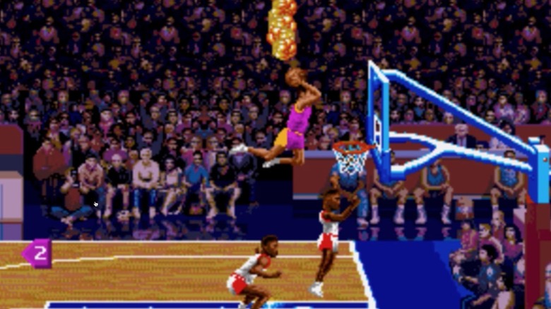 A player leaps for a flaming dunk with a basketball in NBA Jam