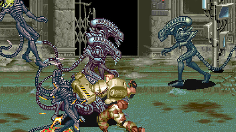 Dutch Schaefer punches a xenomorph with his cybernetic arm in Alien vs. Predator (1994)