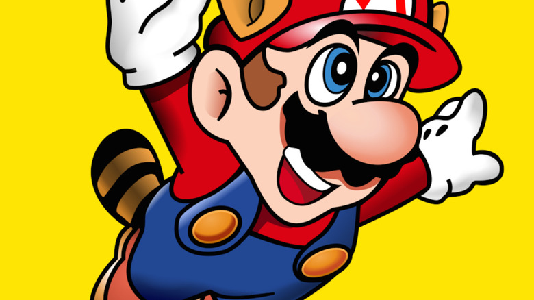 Mario flies while wearing a Tanooki suit on the cover art for Super Mario Bros. 3