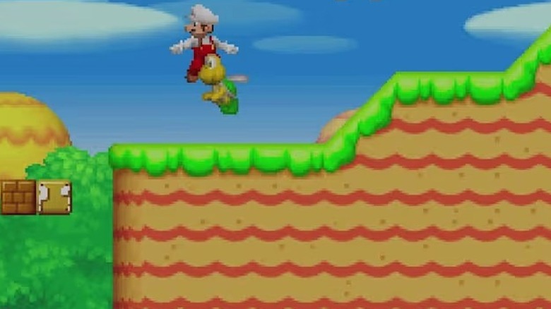 Fire Mario jumps on a Paratroopa in New Super Mario Bros.