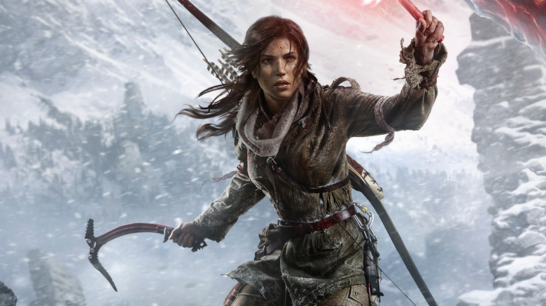 Lara Croft raises a flare on the cover art for Rise of the Tomb Raider