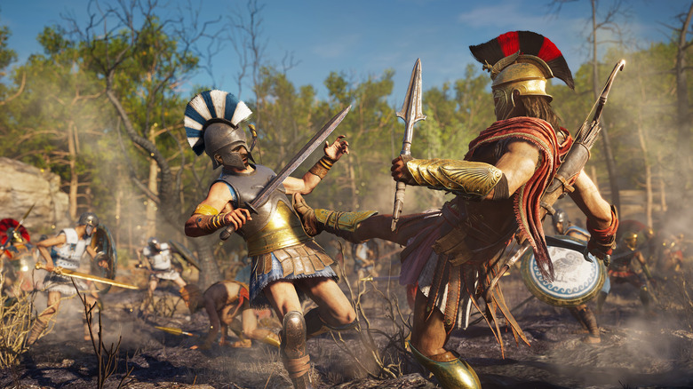 Alexios kicks an enemy soldier in the torso in Assassin's Creed Odyssey
