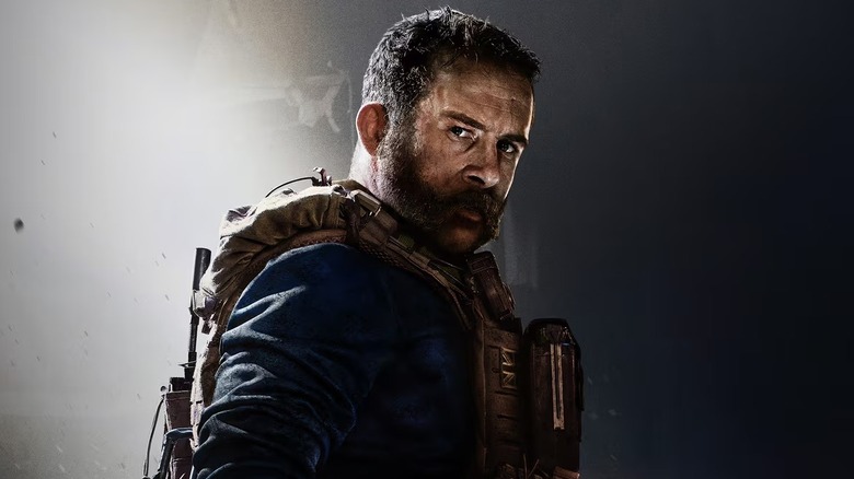 Captain Price stands solemnly in spotlight on the cover of Call of Duty: Modern Warfare