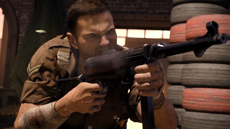 A soldier firing a machinegun in Call of Duty Vanguard