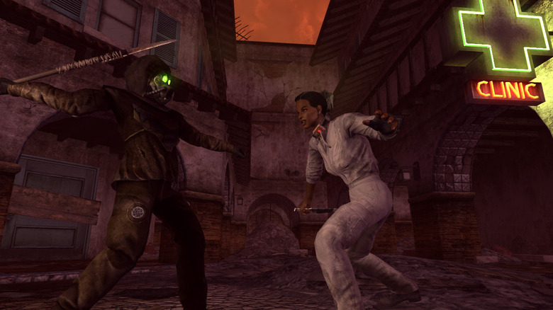 An armored enemy prepares to strike a character with a bomb collar in Fallout: New Vegas