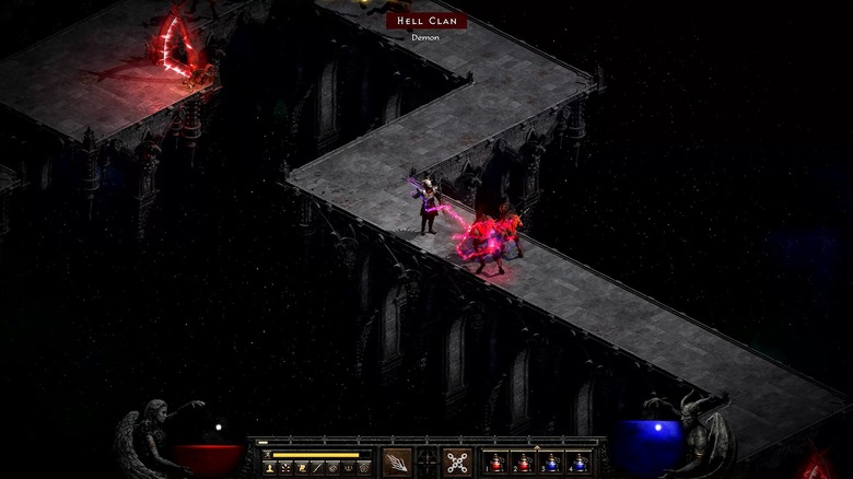 Warlock fighting through dungeon in Diablo 2