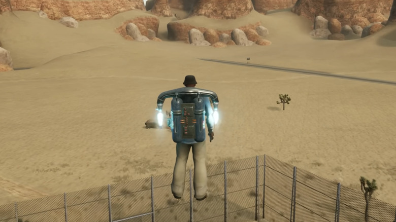 Carl "CJ" Johnson flies across the desert using a jetpack in Grand Theft Auto San Andreas