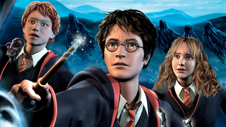 Harry Potter holds up his wand in front of Ron Weasley and Hermoine Granger as they're surrounded by dementors on the cover art for Harry Potter and the Prisoner of Azkaban