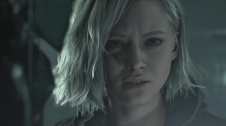 Grace Ashcroft peers into the darkness in Resident Evil Requiem