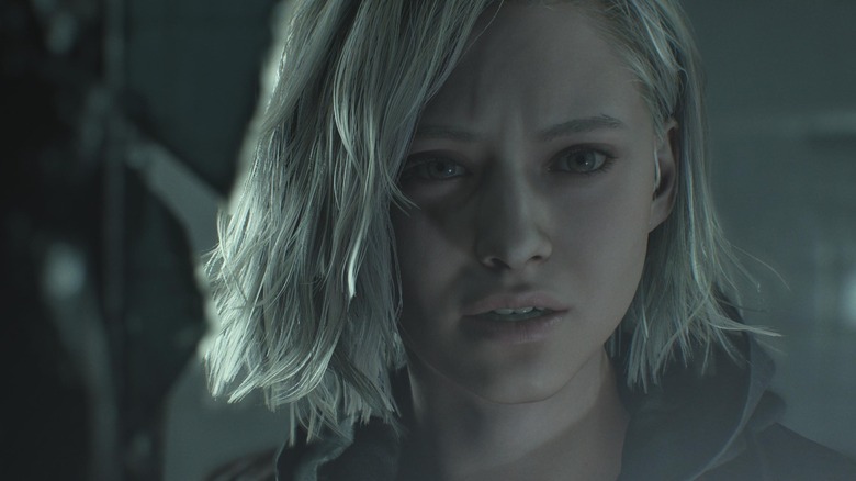 Grace Ashcroft peers into the darkness in Resident Evil Requiem