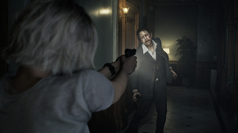 Grace Ashcroft aims a pistol at an advancing zombie in Resident Evil Requiem