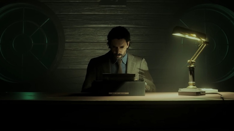 Alan Wake writing in his attic in Alan Wake 2