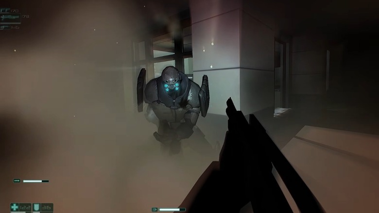 A gun battle in F.E.A.R. Note the smoke/dust effects and the player's shotgun