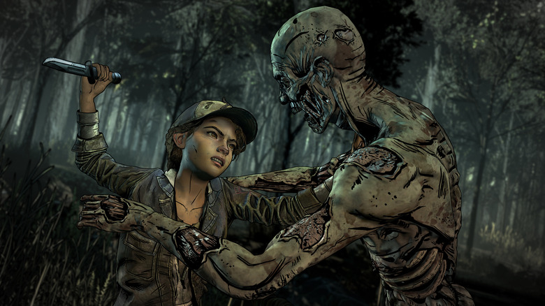 Clementine prepares to stab an attacking zombie in The Walking Dead