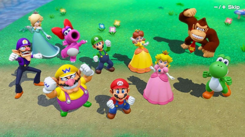 Mario and his friends pose triumphantly by a river in Mario Party Superstars