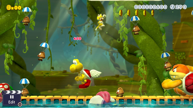 Cat Mario leaps through waves of enemies in Super Mario Maker 2