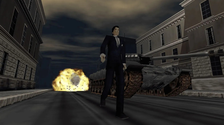 James Bond walks away from an explosion by a parked tank in GoldenEye 007