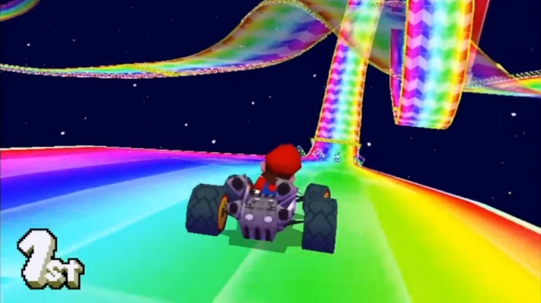 Mario in first place on the Rainbow Road track in Mario Kart DS
