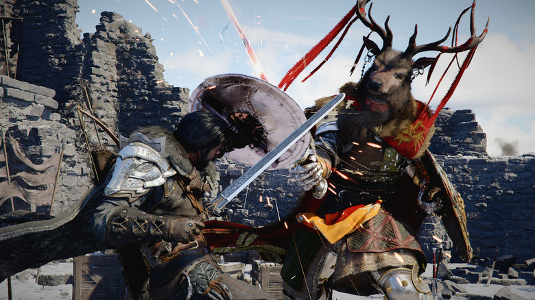 Kliff blocks a warrior's attack in Crimson Desert