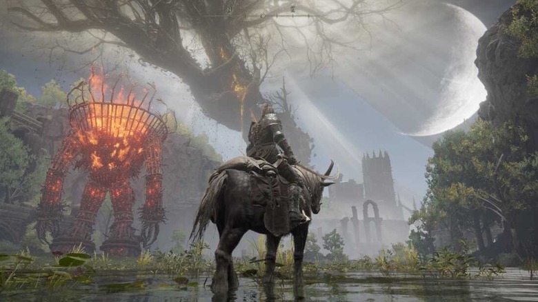 The Tarnished rides on horseback through a marsh by a fire demon in Elden Ring: Shadow of the Erdtree