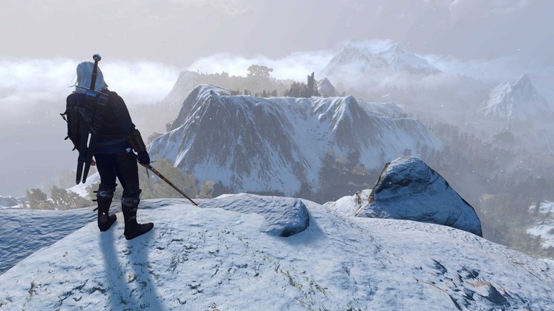 Geralt standing on a snowy mountain in The Witcher 3: Wild Hunt