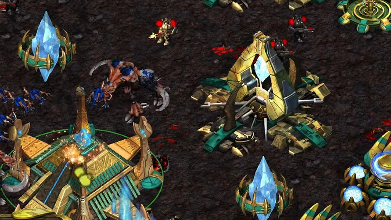 A Protoss base is attacked by Terrans and Zerg in "StarCraft" (1998)