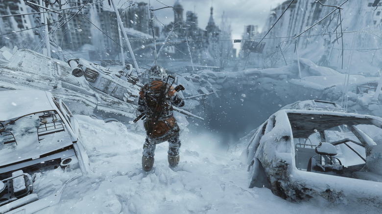 A Metro Exodus character standing in the snow around a snowy tunnel