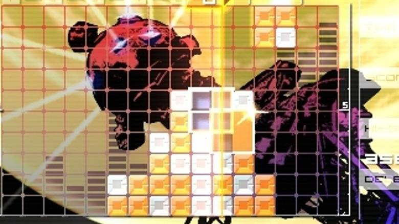 Glowing blocks are stacked together over a sci-fi background in "Lumines: Puzzle Fusion" (2004)