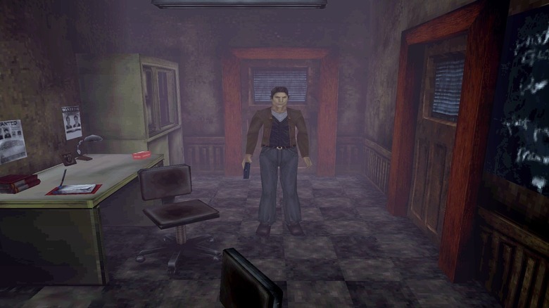 Harry Mason stands in an abandoned office in Silent Hill