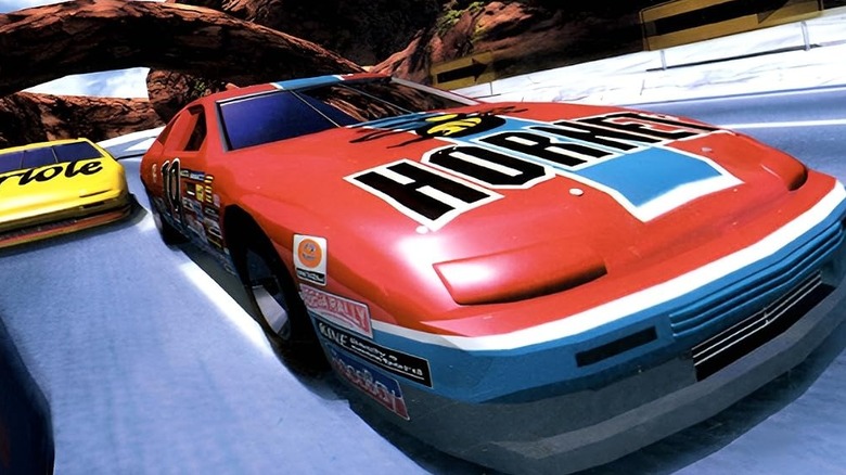 A red hornet cruises into action on the cover art for Daytona USA: Championship Circuit Edition