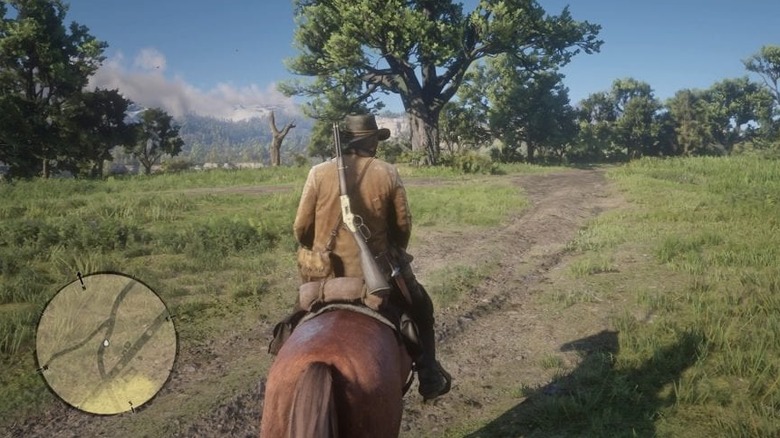 James riding through a field on horseback in Red Dead Redemption 2 (2018)