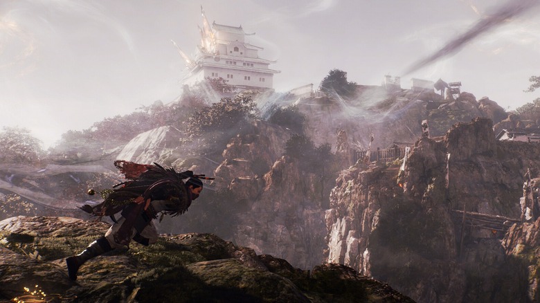 Player running with mountain villa in the background in Nioh 3