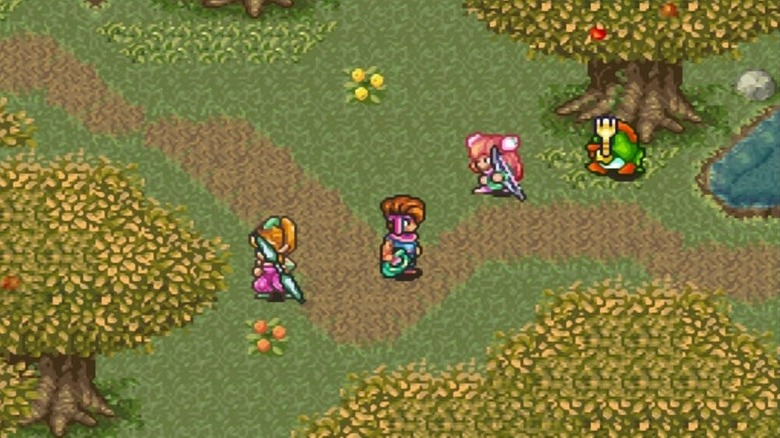 Three heroes walk through a forest in Secret of Mana
