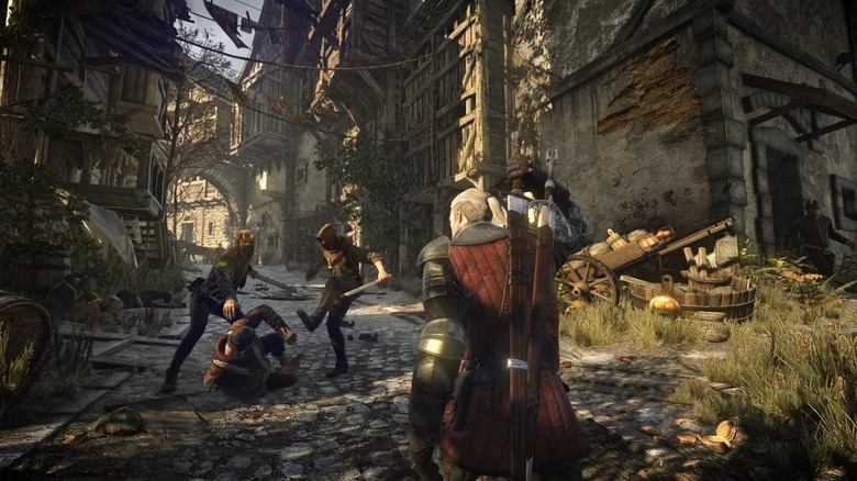 Geralt of Rivia draws his sword as he approaches a man being attacked by thieves in The Witcher 3: Wild Hunt