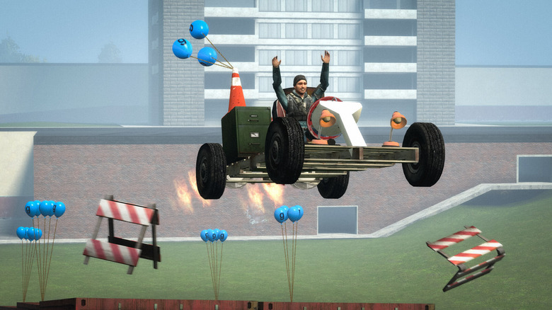 A player riding a car in Garry's Mod
