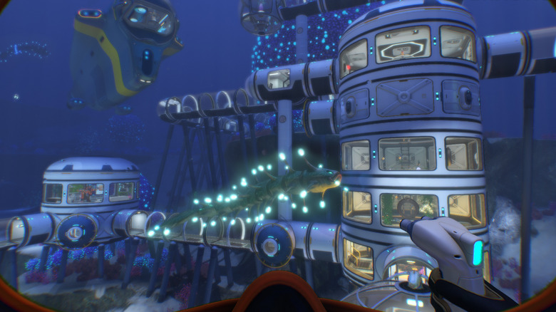 A Subnautica base being built with a Cyclops in the background