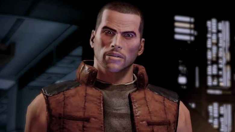 Commander Shepard glares in "Mass Effect 2" (2010)