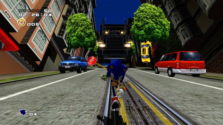 Sonic runs downhill as a big rig truck chases him in Sonic Adventure 2