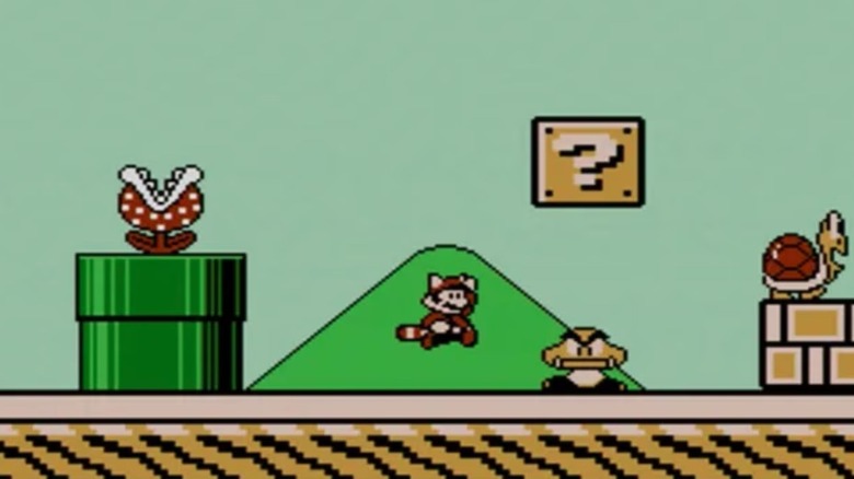 Mario leaps at a giant Goomba in Super Mario Bros. 3